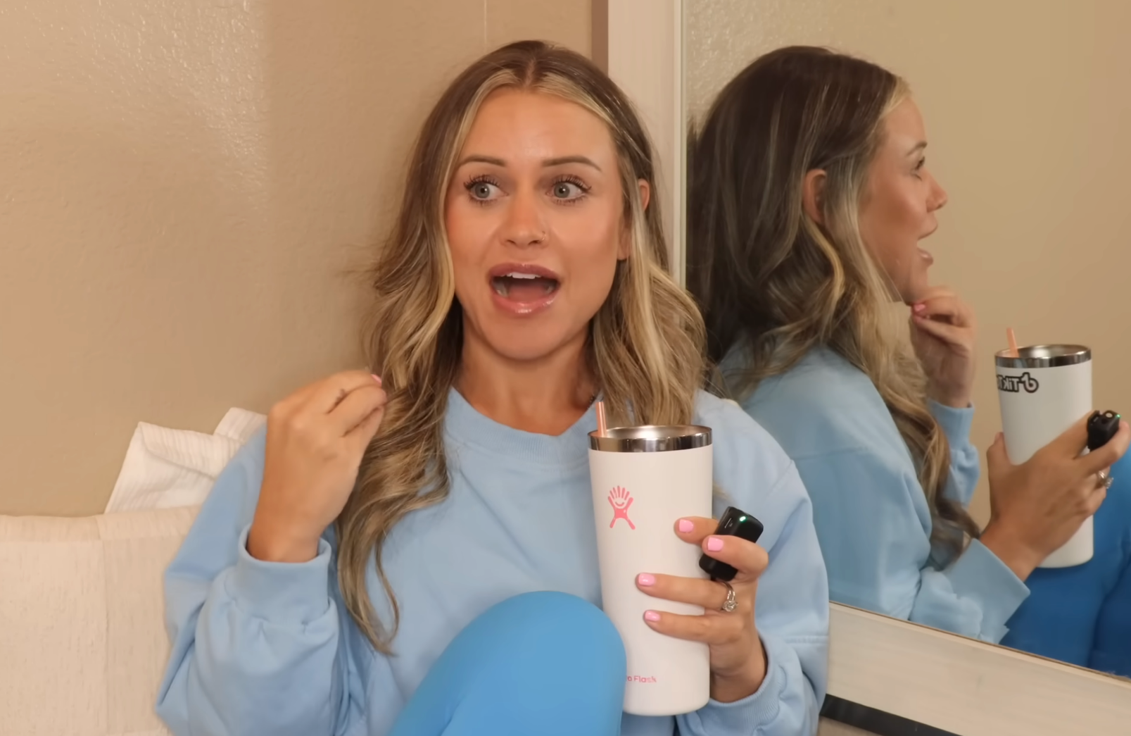 Janelle Rohner speaking in a YouTube video