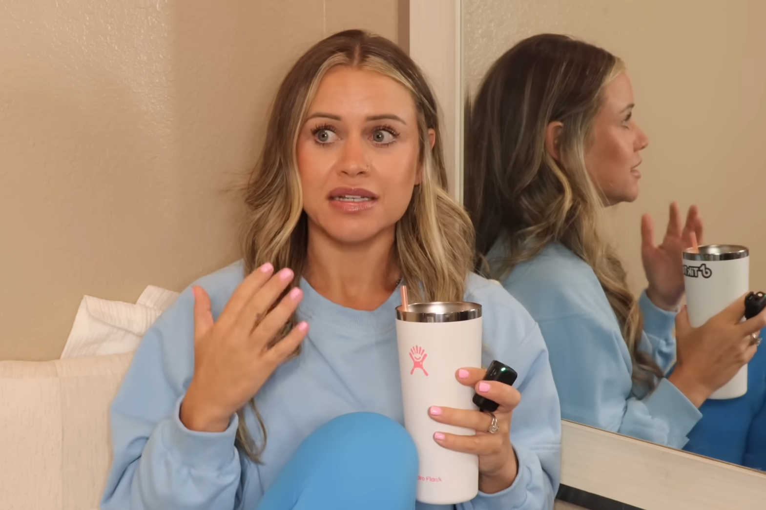 Janelle Rohner speaking in a YouTube video