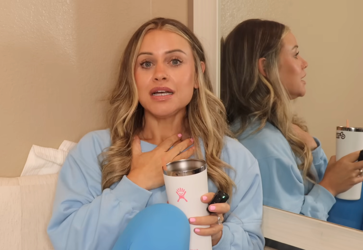 Janelle Rohner speaking in a YouTube video