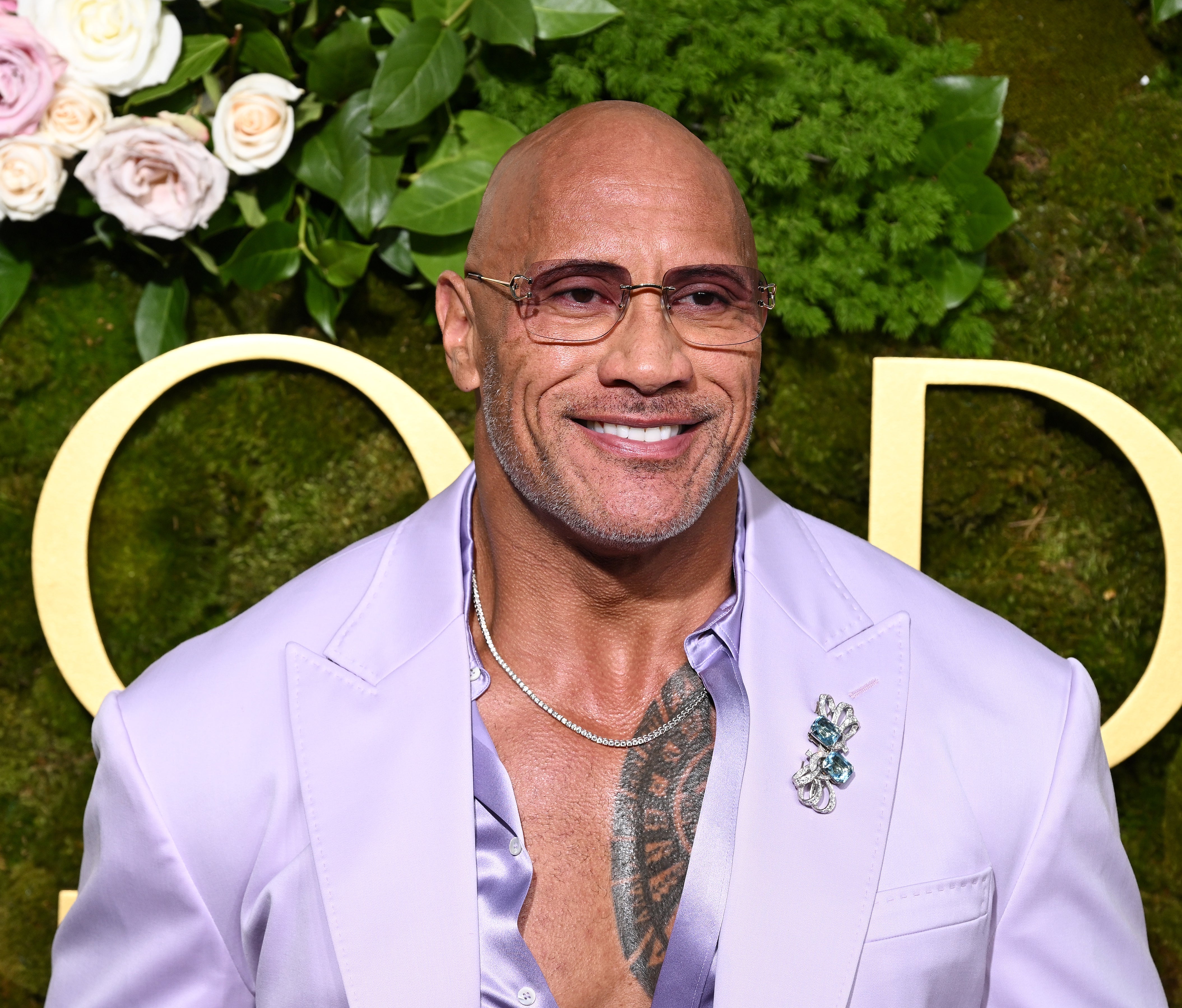 Dwayne Johnson smiling at an event