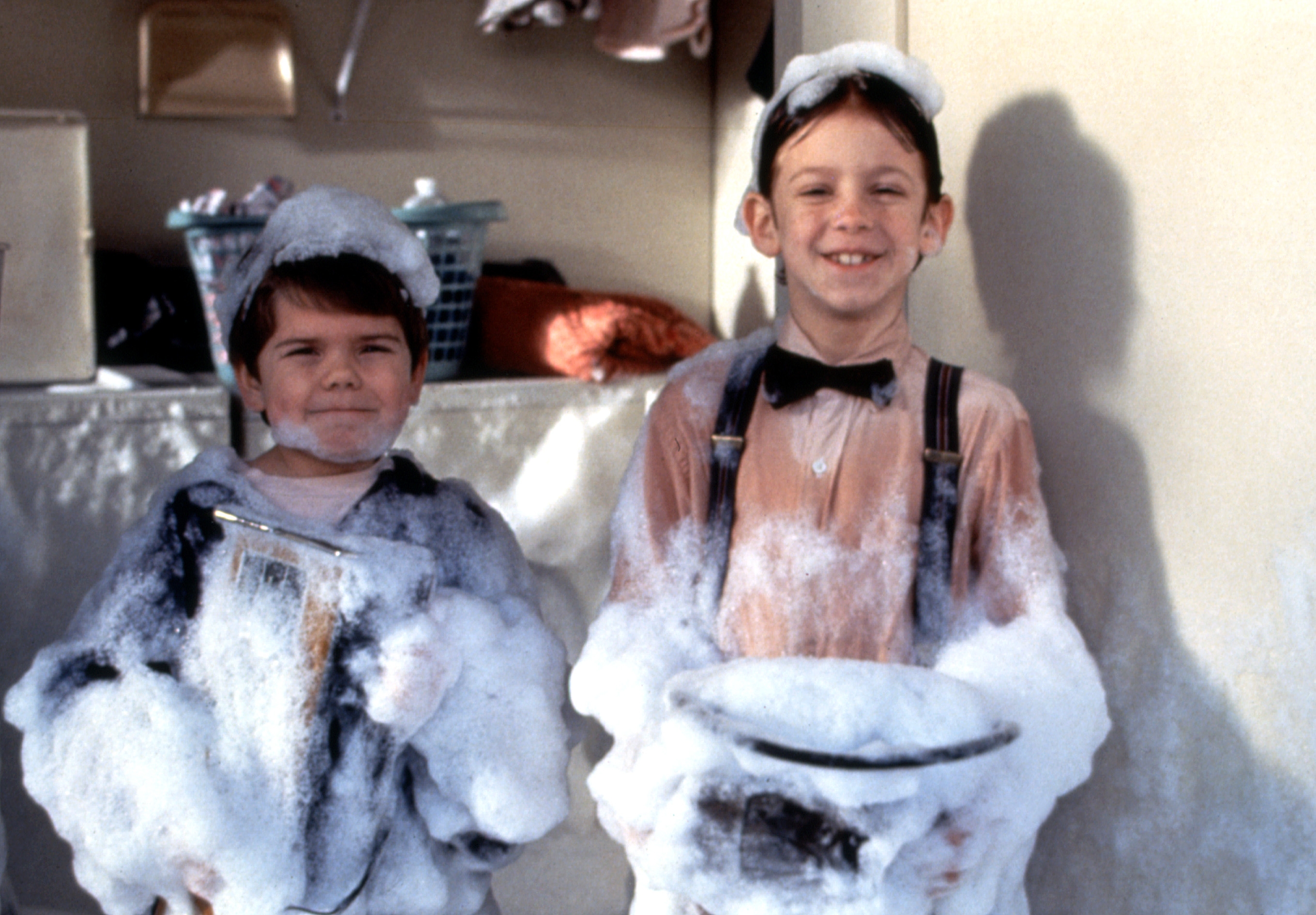 Travis Tedford and Bug Hall covered in soap suds in "The Little Rascals."