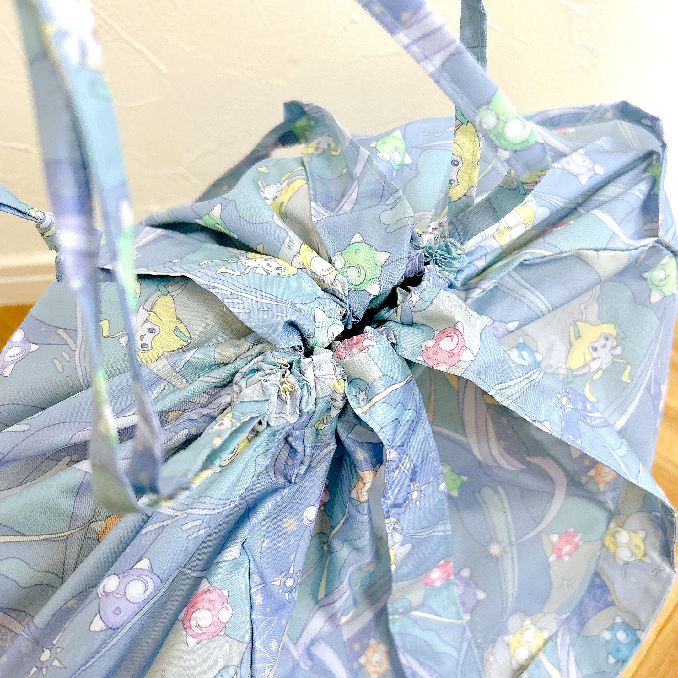 ポケモンセンター「レインバッグカバー ジラーチ星つなぎ」