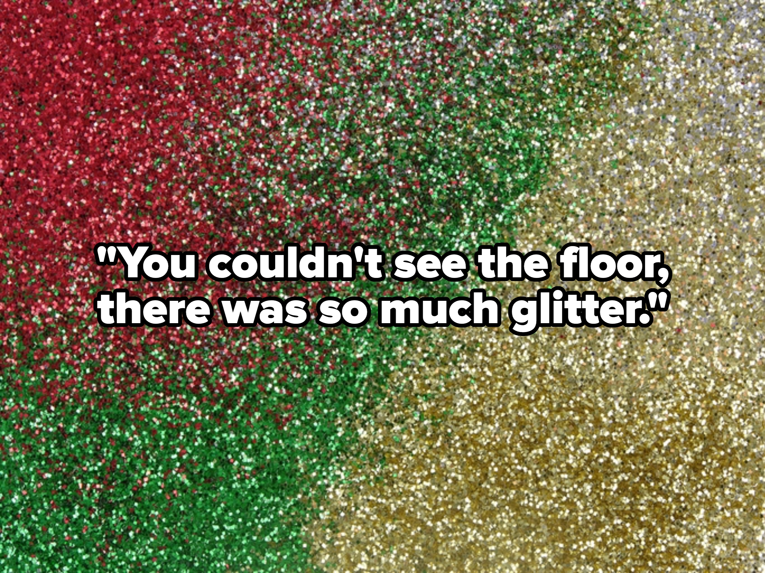 A close-up of densely packed red, green, and gold glitter blending together, creating a festive and shimmering texture