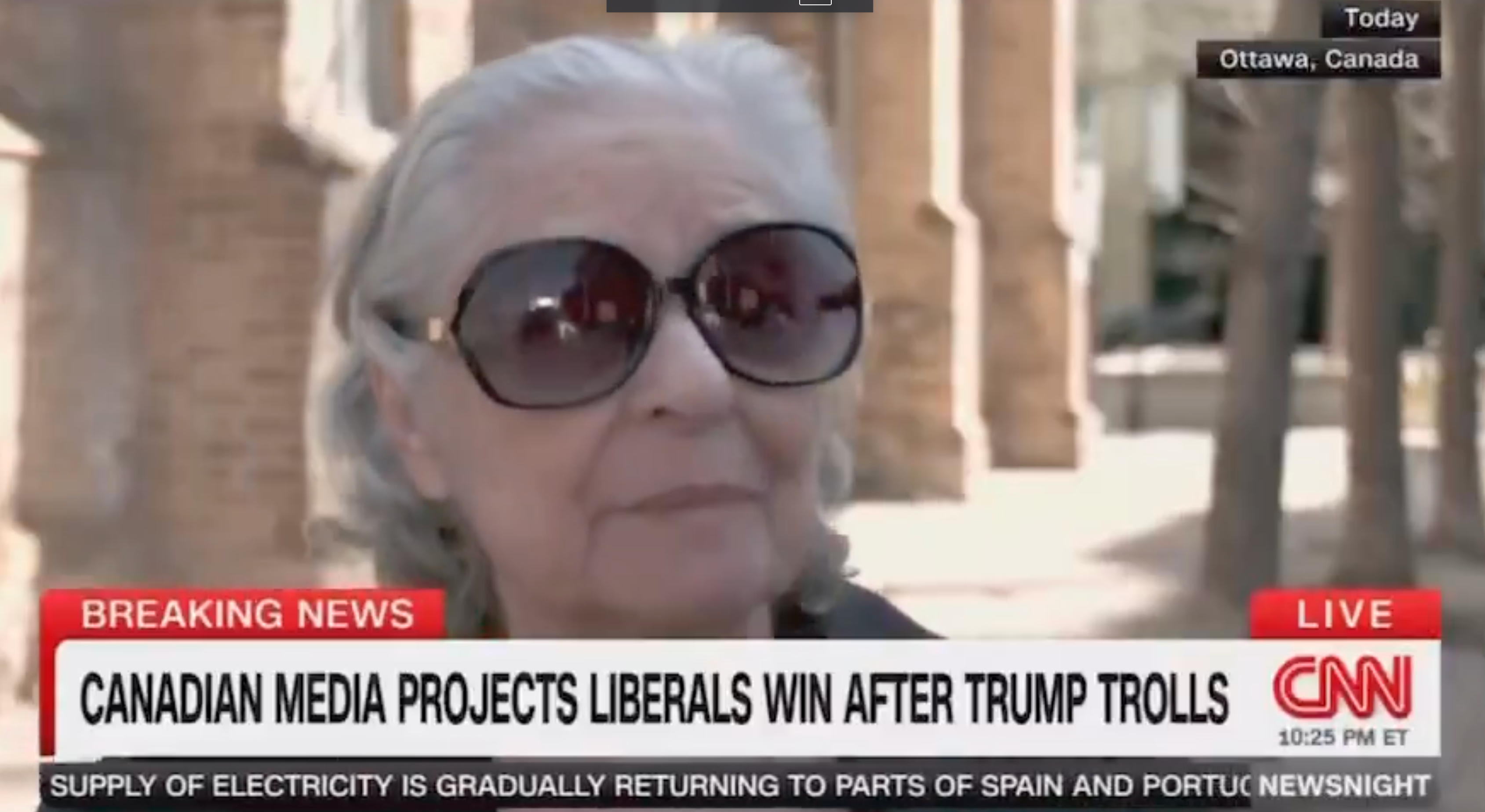 Older woman wearing large sunglasses in a CNN news clip from Ottawa, Canada. Headline: &quot;Canadian media projects liberals win after Trump trolls.&quot;