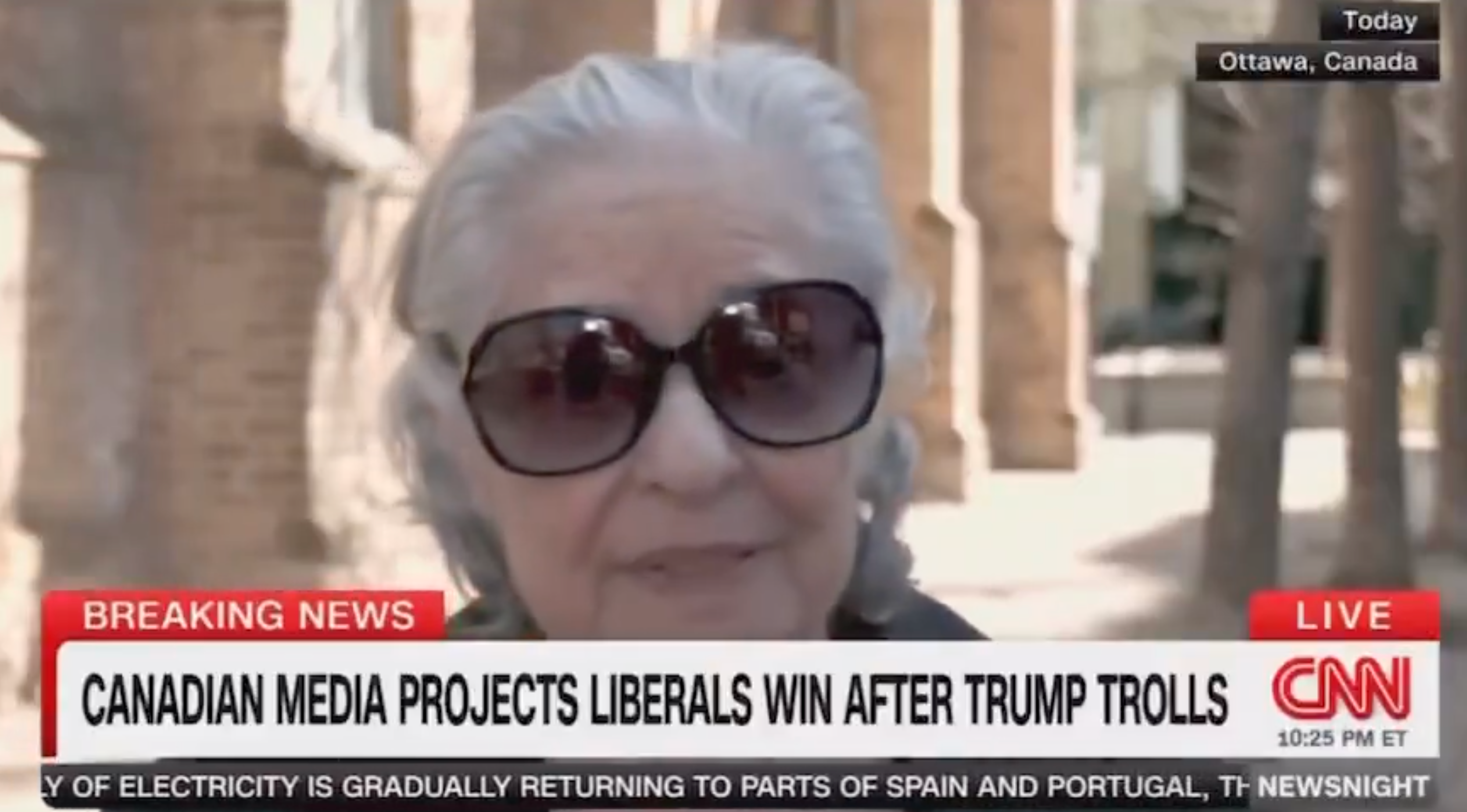 Elderly woman wearing sunglasses in a street interview clip from CNN with a headline about Canadian media projecting election results