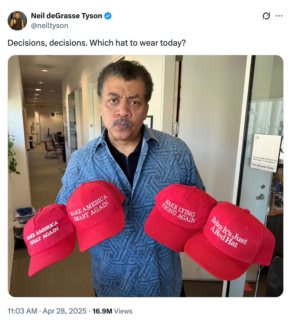 Neil deGrasse Tyson holding four red hats, each with different humorous text commentaries on public slogans