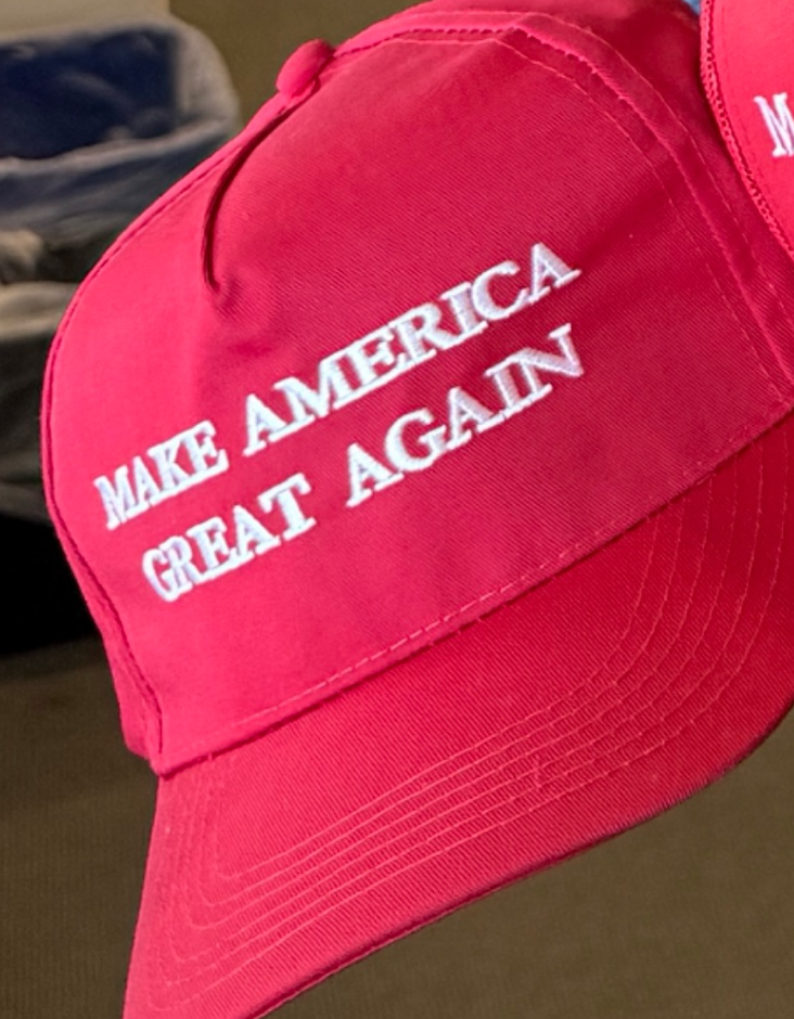 Red cap displaying the words "Make America Great Again" embroidered in white