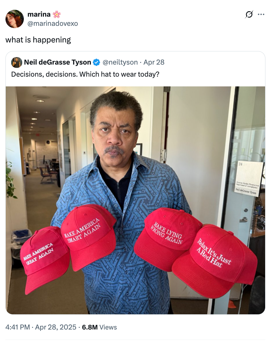 Neil deGrasse Tyson holding four red caps with different phrases about political decisions and red hats