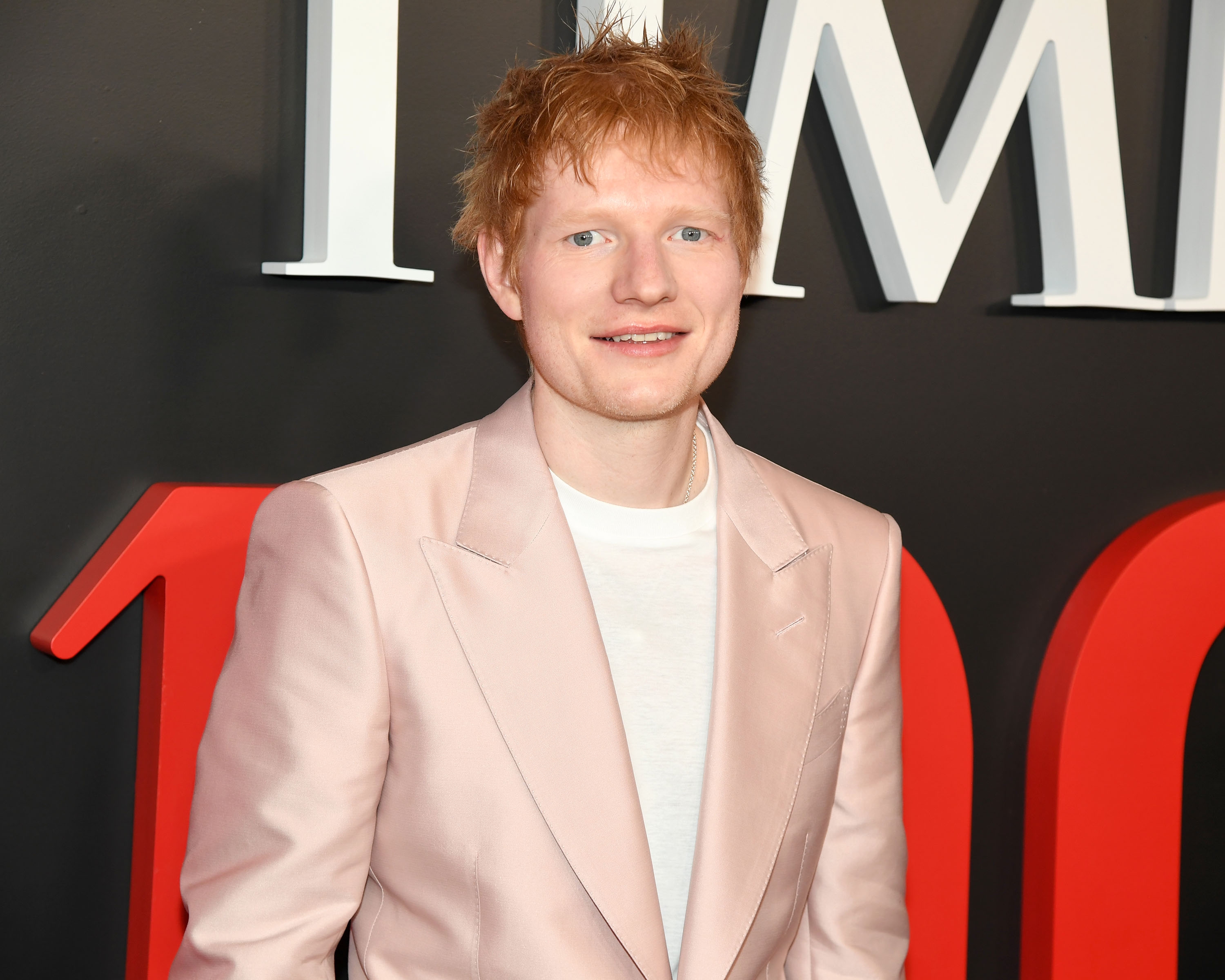 Ed Sheeran on a red carpet at a public event