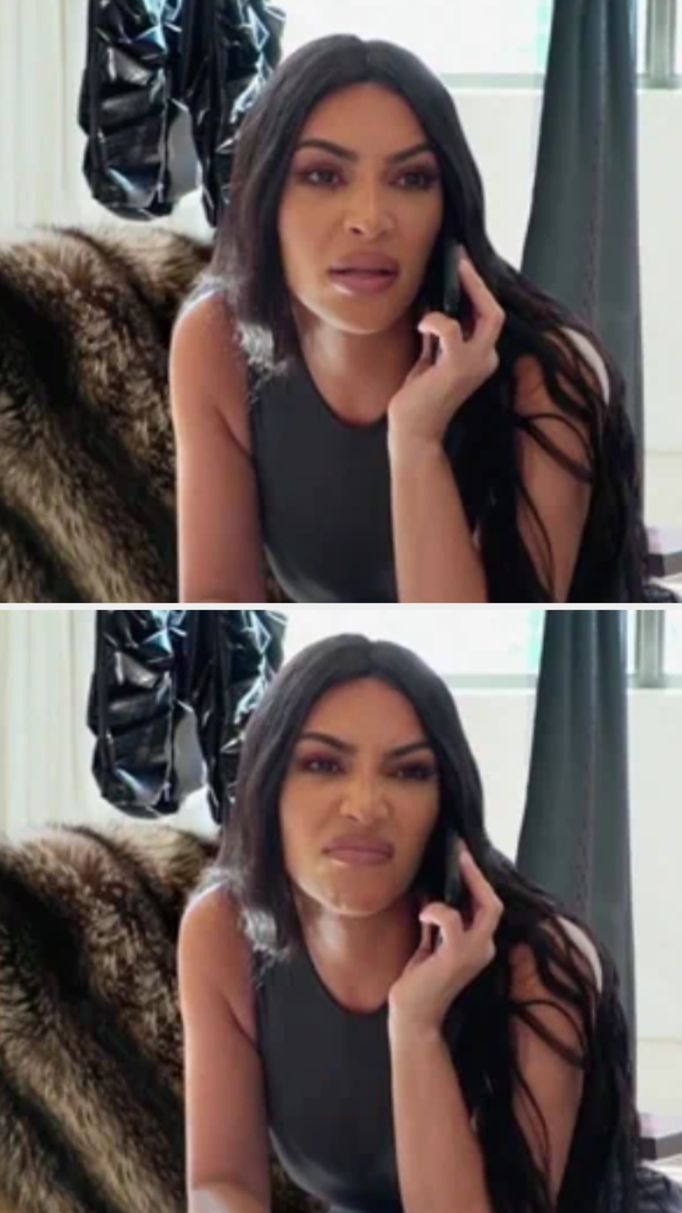 Person on phone, making expressive faces. They have long, sleek hair and are wearing a sleeveless top. Fur coat and curtains visible in the background