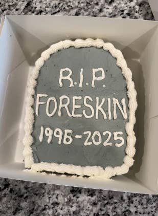 Cake shaped like a tombstone with text: "R.I.P. Foreskin 1995-2025."