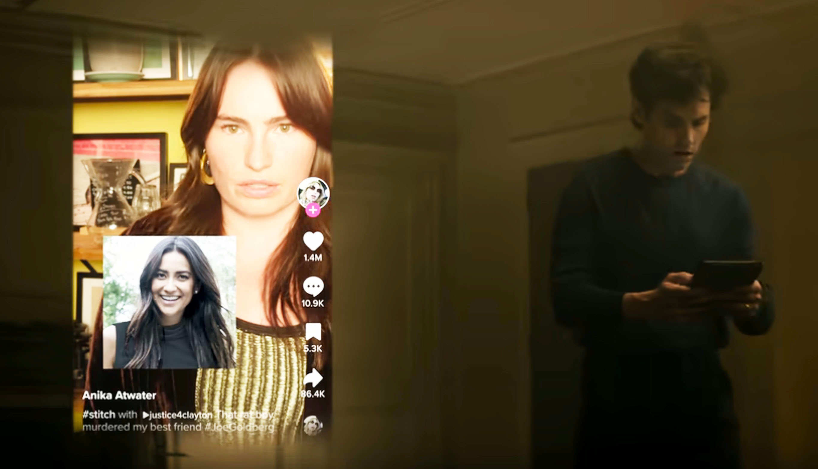 A man looks at a phone showing a video chat with two women discussing a dramatic event