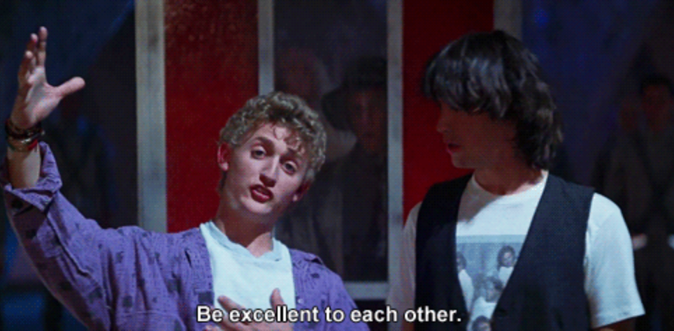 Two individuals in casual clothing, with one gesturing expressively, accompanied by the caption, "Be excellent to each other."