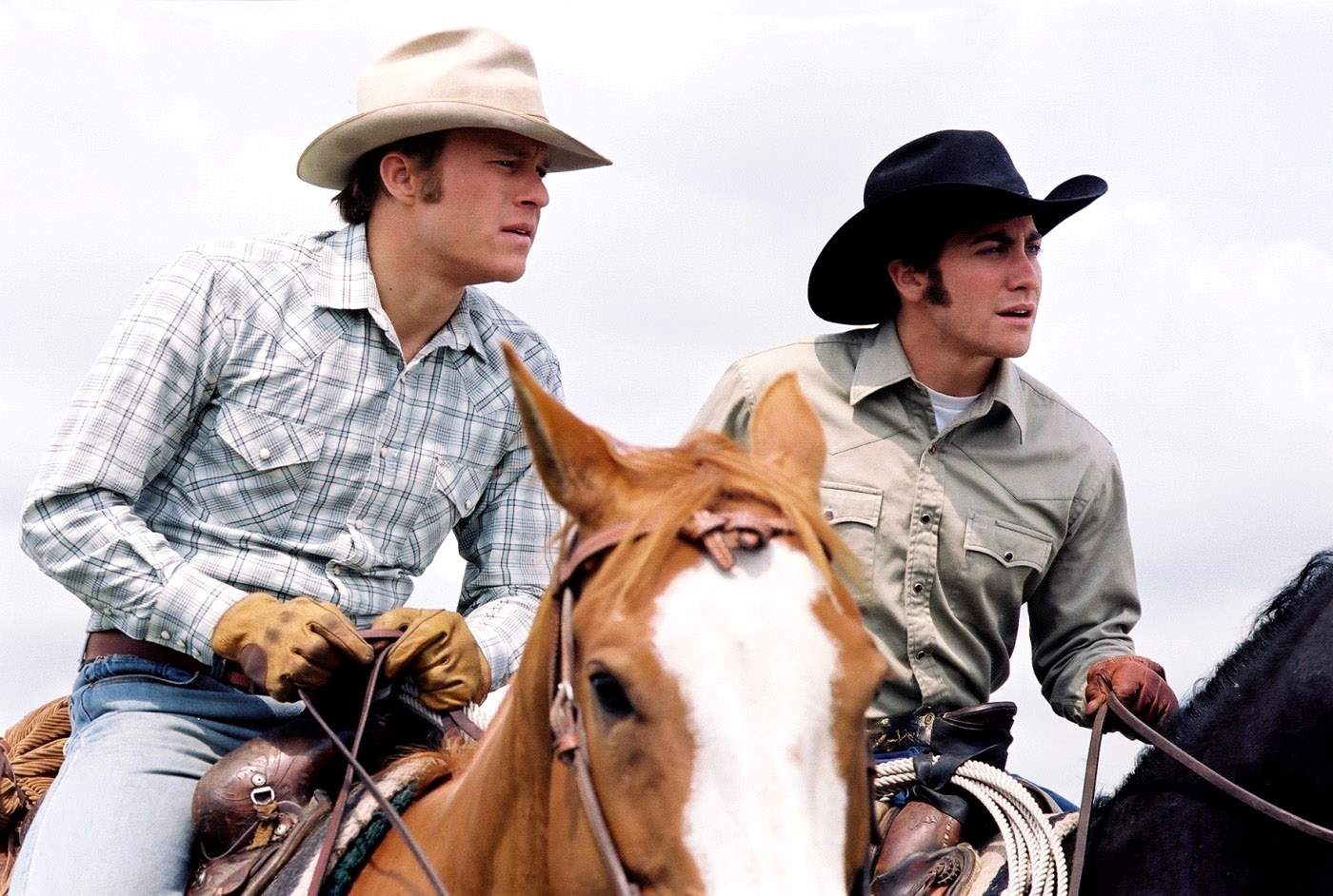 Heath Ledger, Jake Gyllenhaal on horses in a "Brokeback Mountain" scene