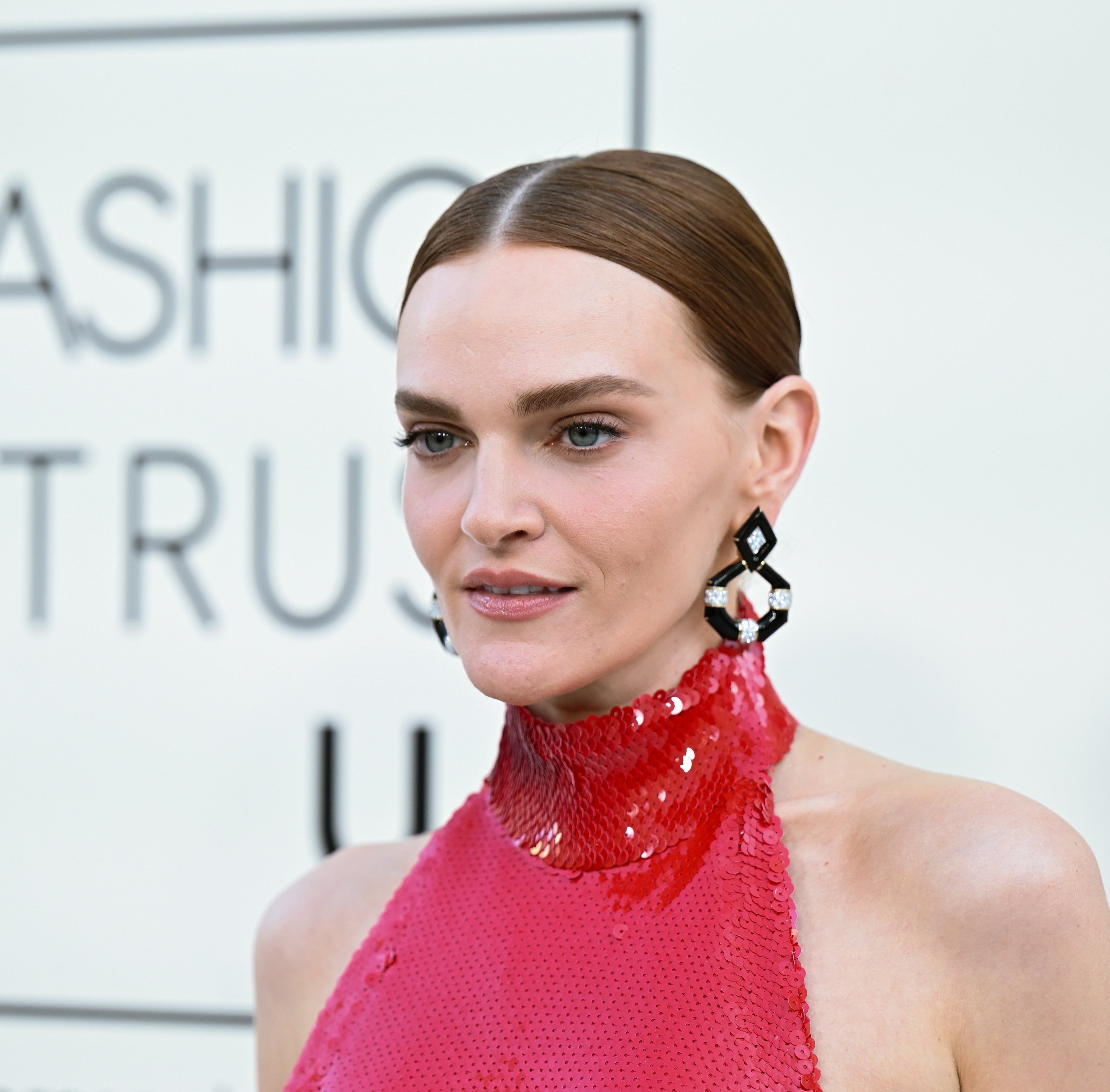 Close up of Madeline Brewer on a red carpet