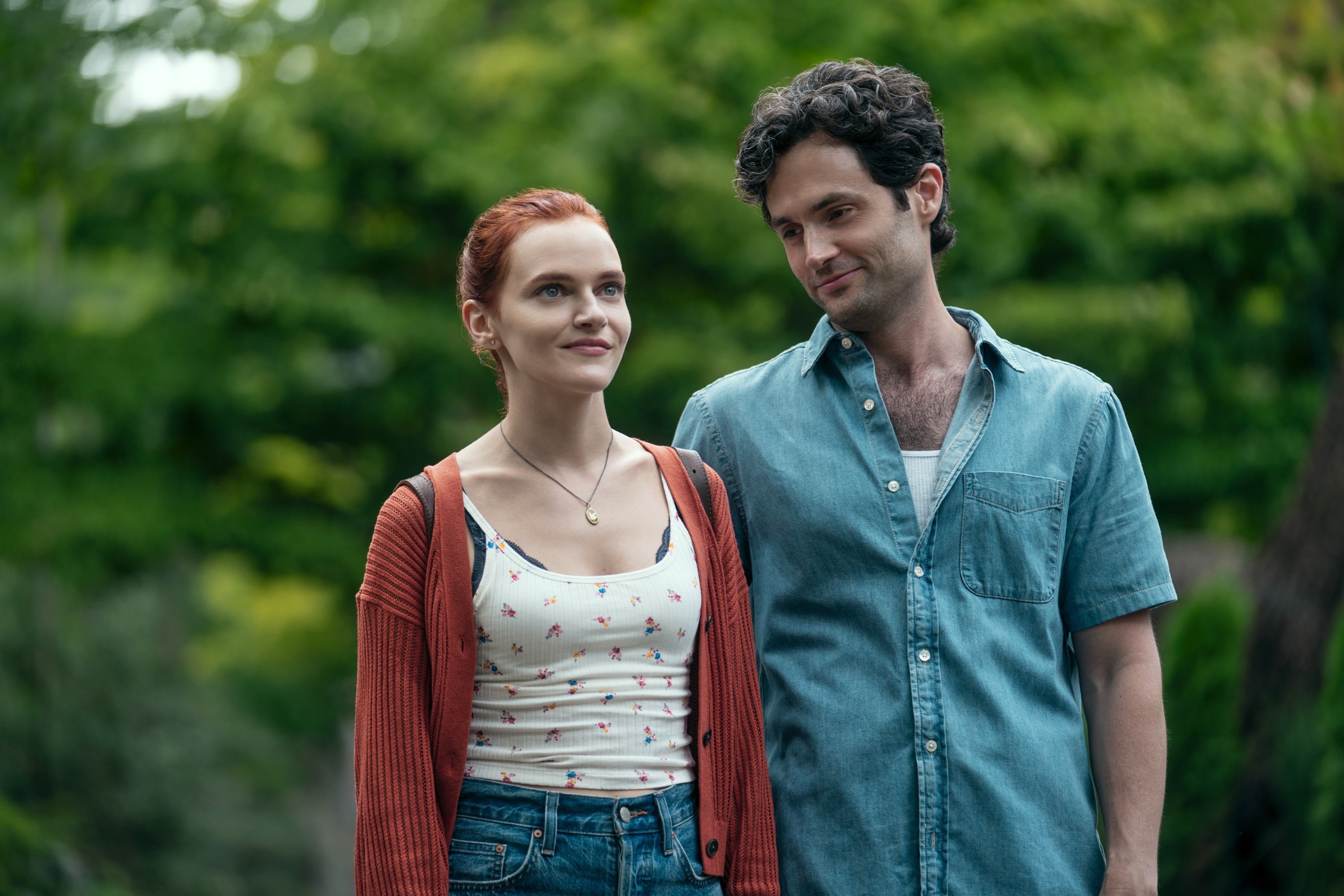 Madeline Brewer and Penn Badgley in a scene from "You"