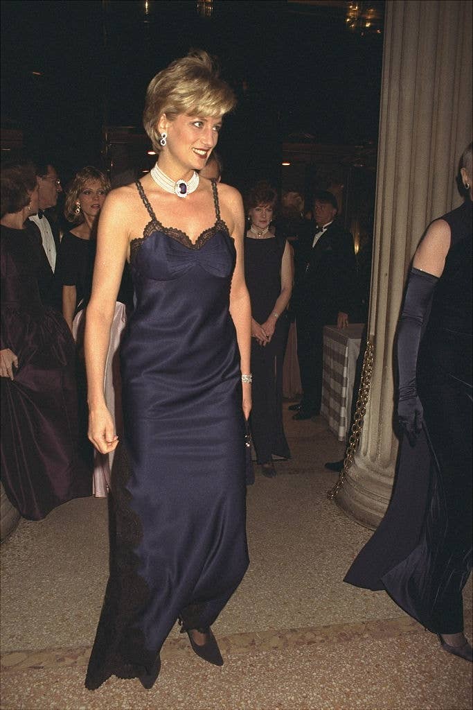Princess Diana in a flowy, spaghetti strap dress with lace details