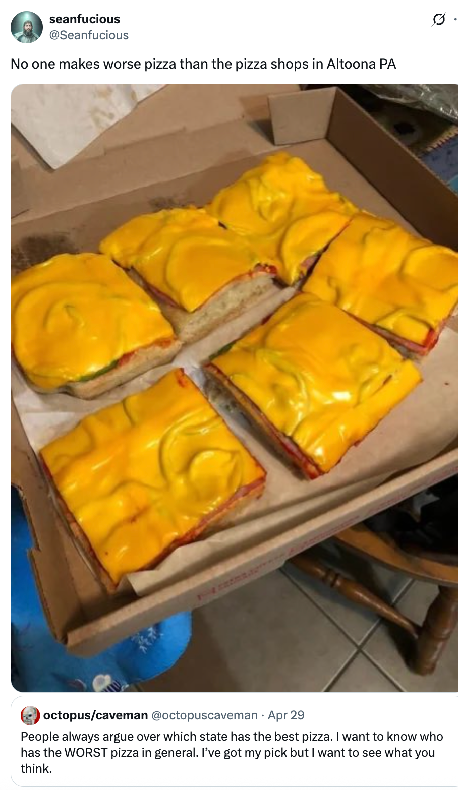Thick rectangular pizza with a layer of melted yellow cheese, served in a pizza box, captioned humorously critiquing its quality