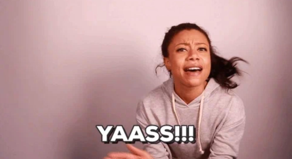 Person enthusiastically exclaims "YAASS!!!" while clapping, conveying excitement and approval