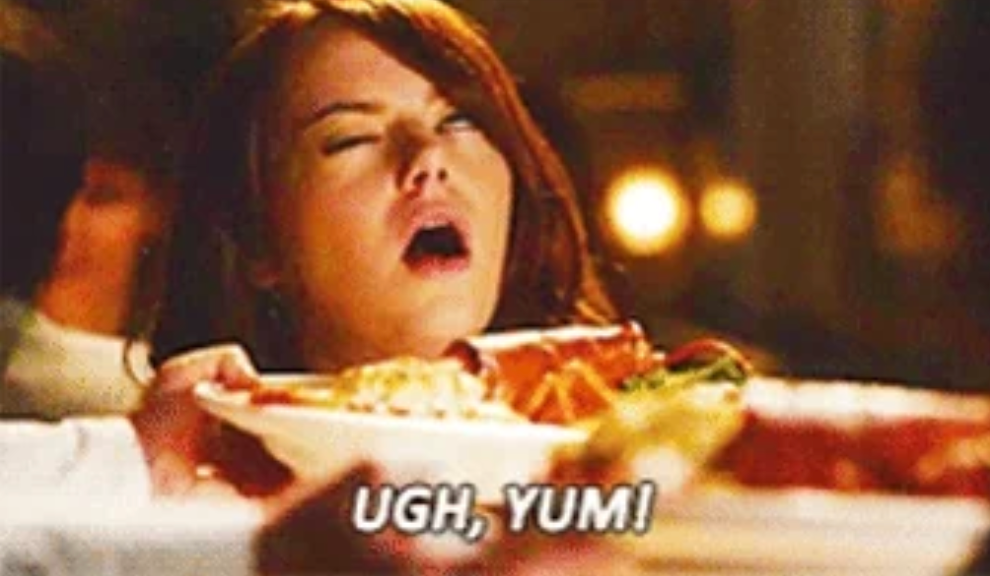 Person enjoying food with eyes closed in delight, text below reads "UGH, YUM!"