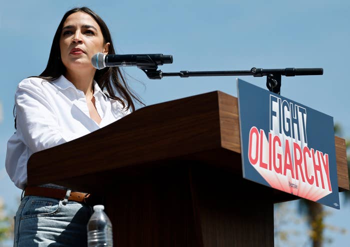 Person speaking at a podium with 