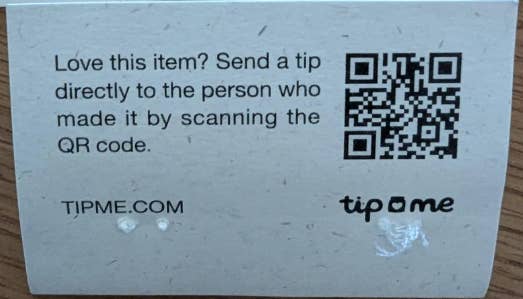 Clothing tag for "DAWN DENIM SELENE Wide Leg." Priced at 129 EUR. Includes a QR code for sending a tip to the creator