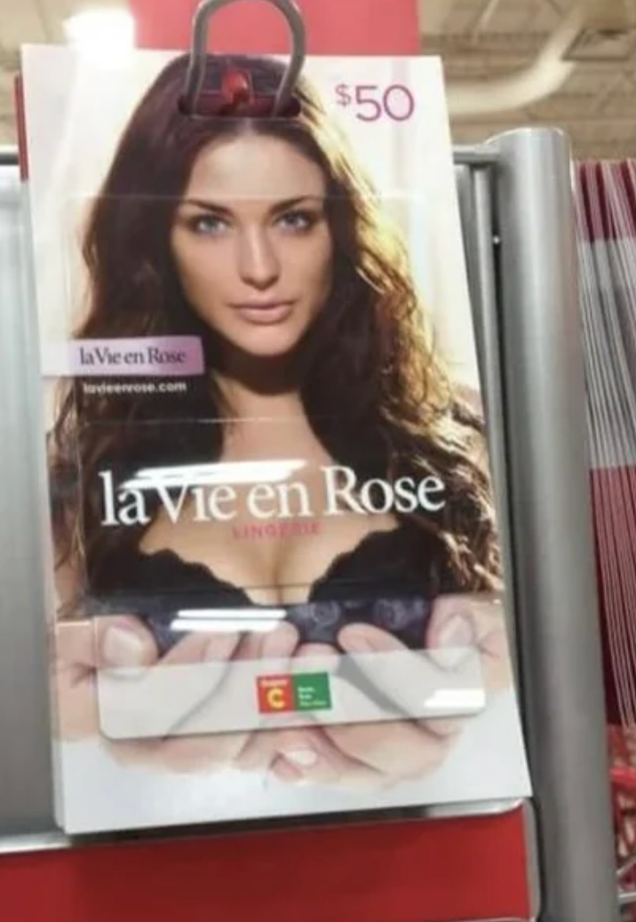 Gift card display with a person on the cover wearing lingerie. The card value is $50 from La Vie en Rose
