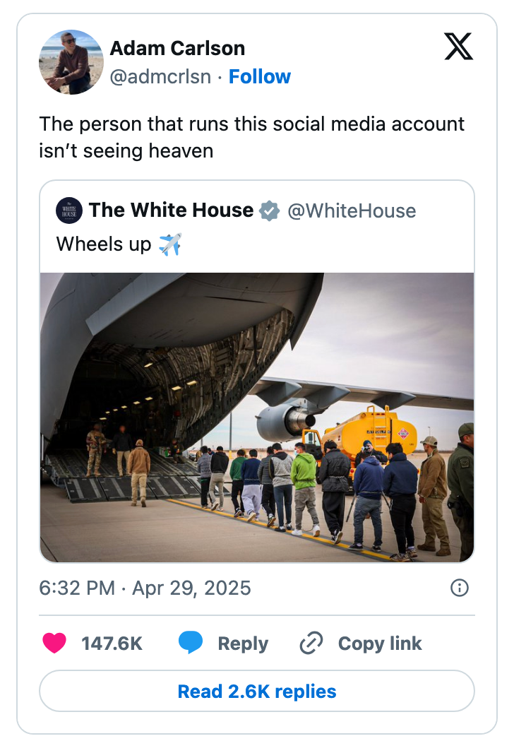 Tweet screenshot of a line of people boarding a large military plane through an open ramp