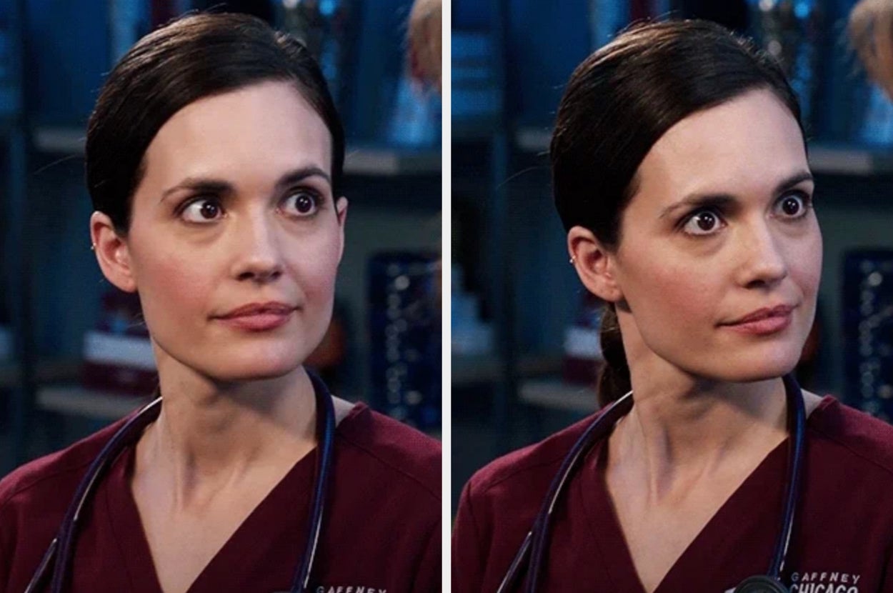 Doctor in medical attire with a stethoscope looks to the side in a hospital setting, appearing shocked