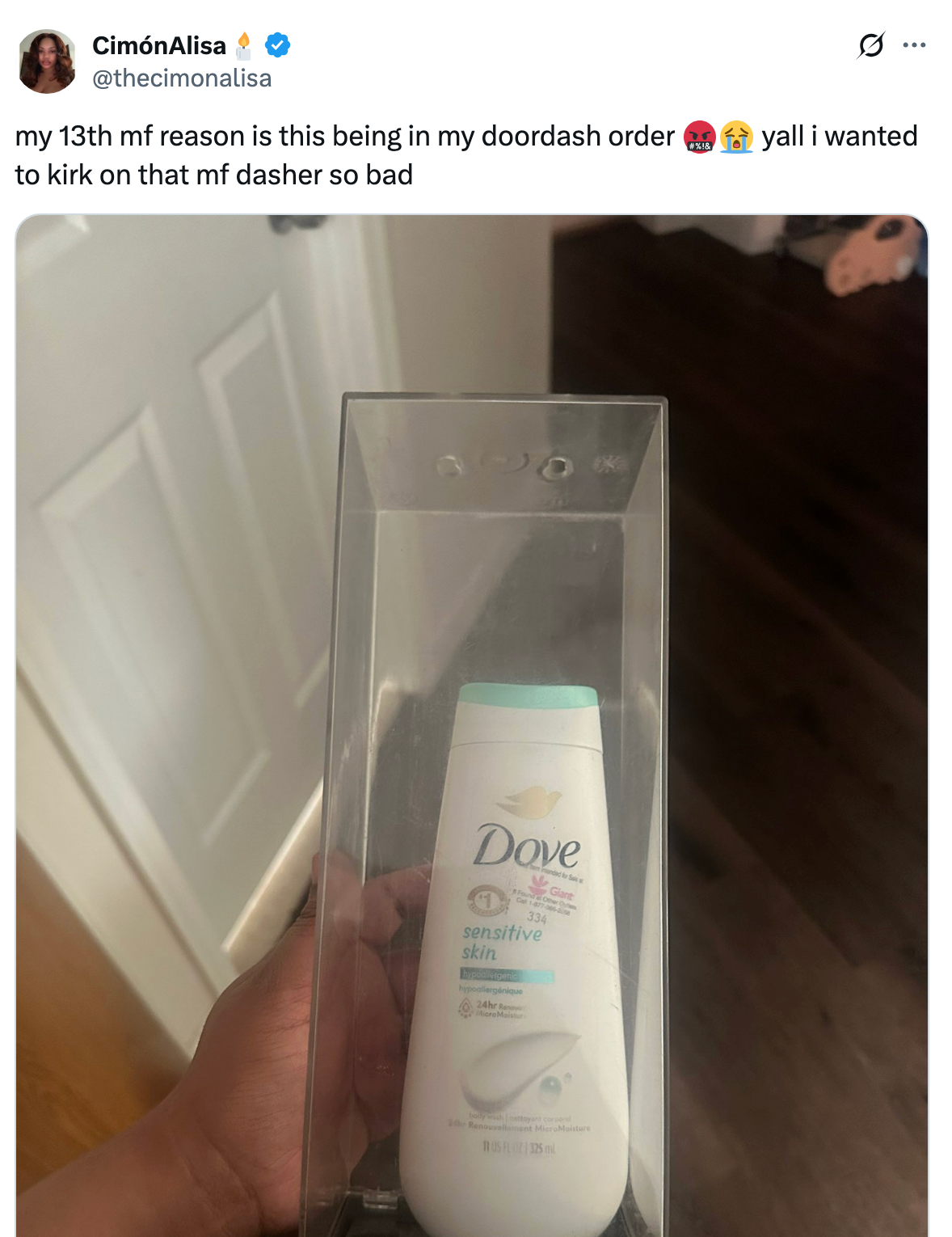 A person holds a box with a Dove Sensitive Skin body wash inside, alongside a tweet expressing frustration about receiving it in a DoorDash order
