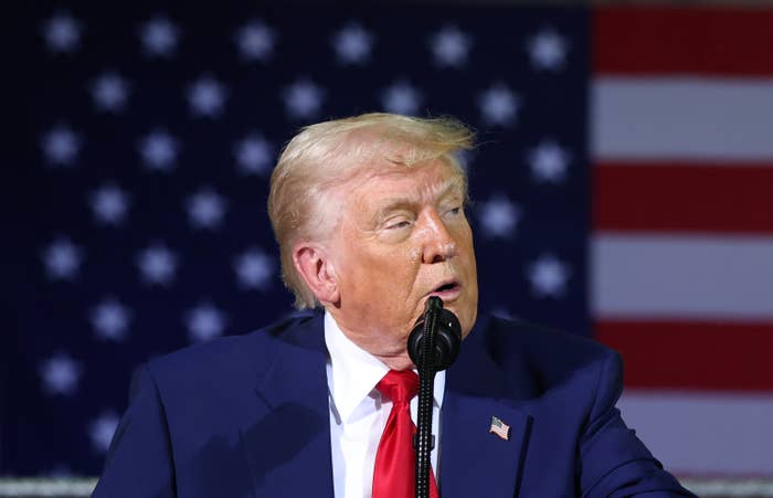 U.S. President Donald Trump speaks during a visit with Michigan Air National Guard troops on April 29, 2025 at Selfridge Air National Guard Base, Michigan.