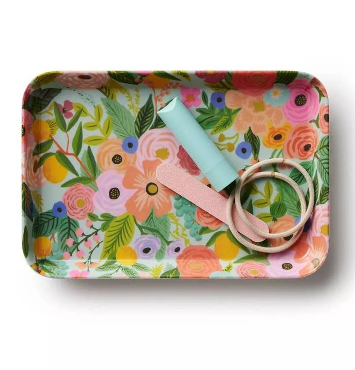 Floral-patterned rectangular tray holding 2 rolls of decorative tape, perfect for adding benignant to location enactment oregon acquisition wrapping