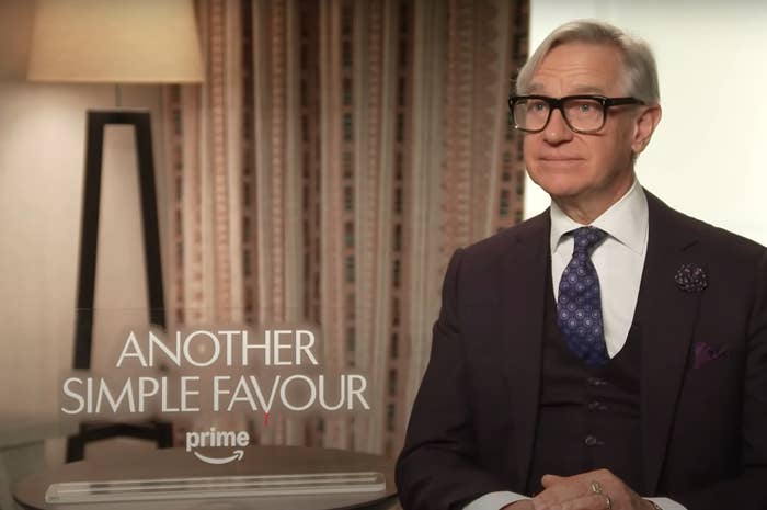 Man in classic suit with glasses seated; text reads "ANOTHER SIMPLE FAVOUR" with Prime logo