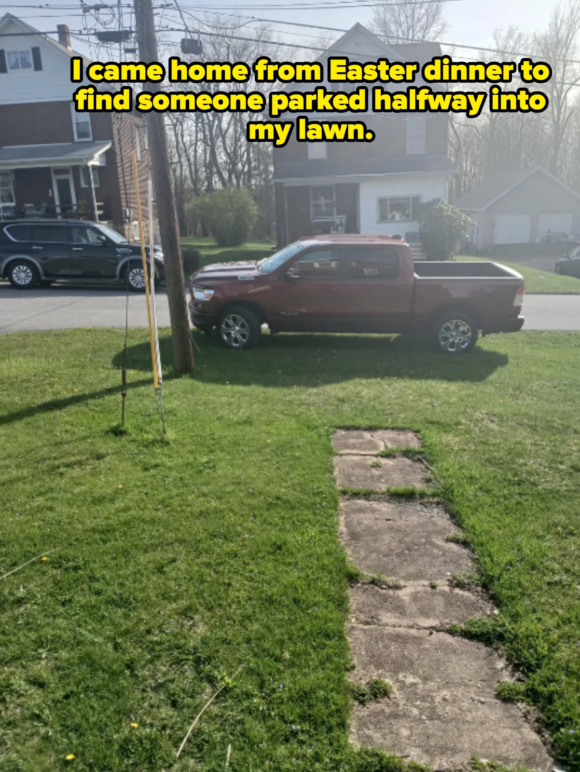 A red pickup truck is parked on a grassy lawn next to a street, with houses and trees in the background. Caption: &quot;I came home from Easter dinner to find someone parked halfway into my lawn&quot;