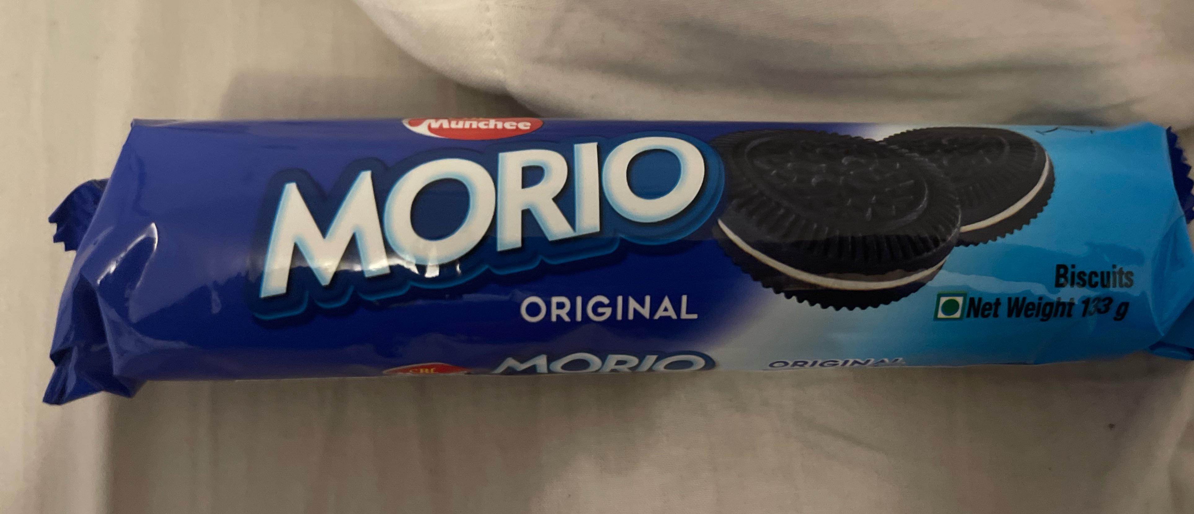 A package of "Morio" cookies, resembling sandwich biscuits, is placed on a surface