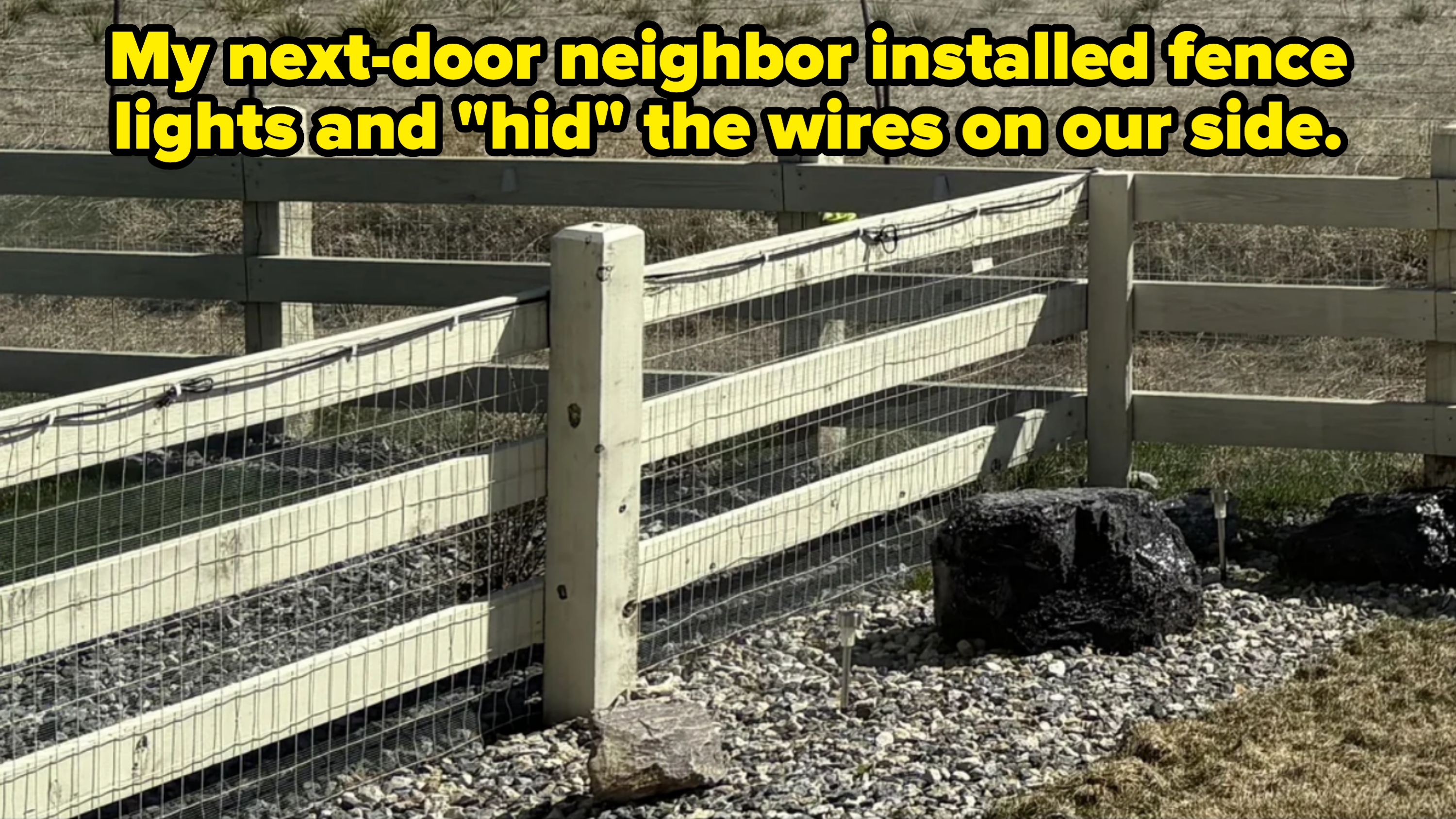 A wood fence with wire mesh on one side. Caption: &quot;My next-door neighbor installed fence lights and &#x27;hid&#x27; the wires on our side&quot;