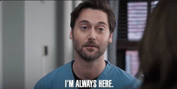 Man in a medical setting with short hair and beard looks at someone. He says, "I'm always here."