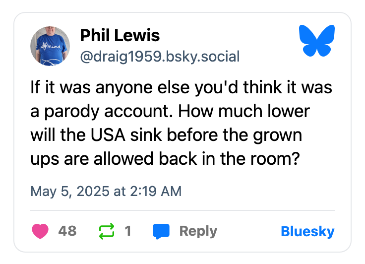 Tweet by Phil Lewis questioning the current state of the USA, suggesting it resembles a parody account