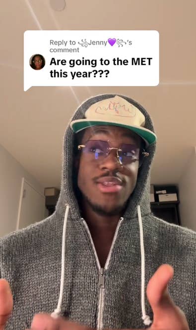 Person in hoodie and cap responds to a comment asking if they&#x27;re attending the MET this year