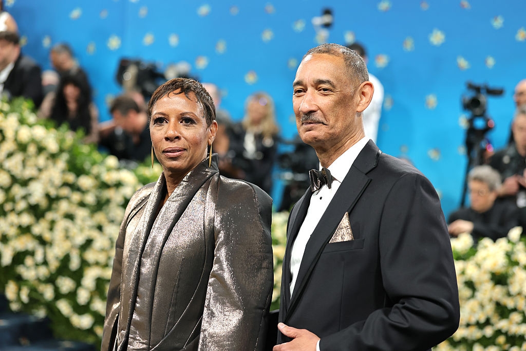 close-up of the couple, showcasing her large earrings