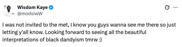 Tweet from @modsiwW expressing not being invited to the Met Gala and looking forward to black dandyism interpretations