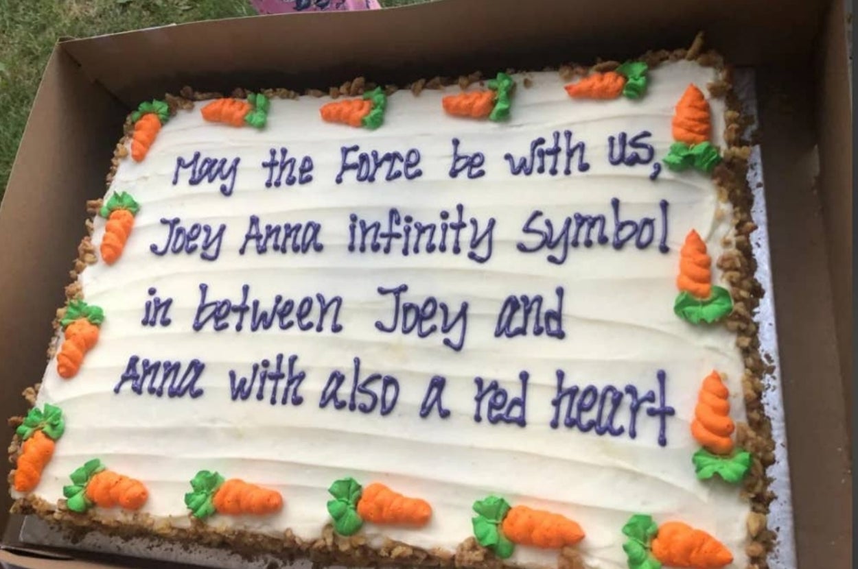 Cake with text: "May the Force be with us, Joey Anna infinity symbol in between Joey and Anna with also a red heart," decorated with carrot shapes