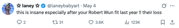Tweet expressing disbelief and support, mentioning a Robert Wun outfit, with high engagement through likes, comments, and retweets