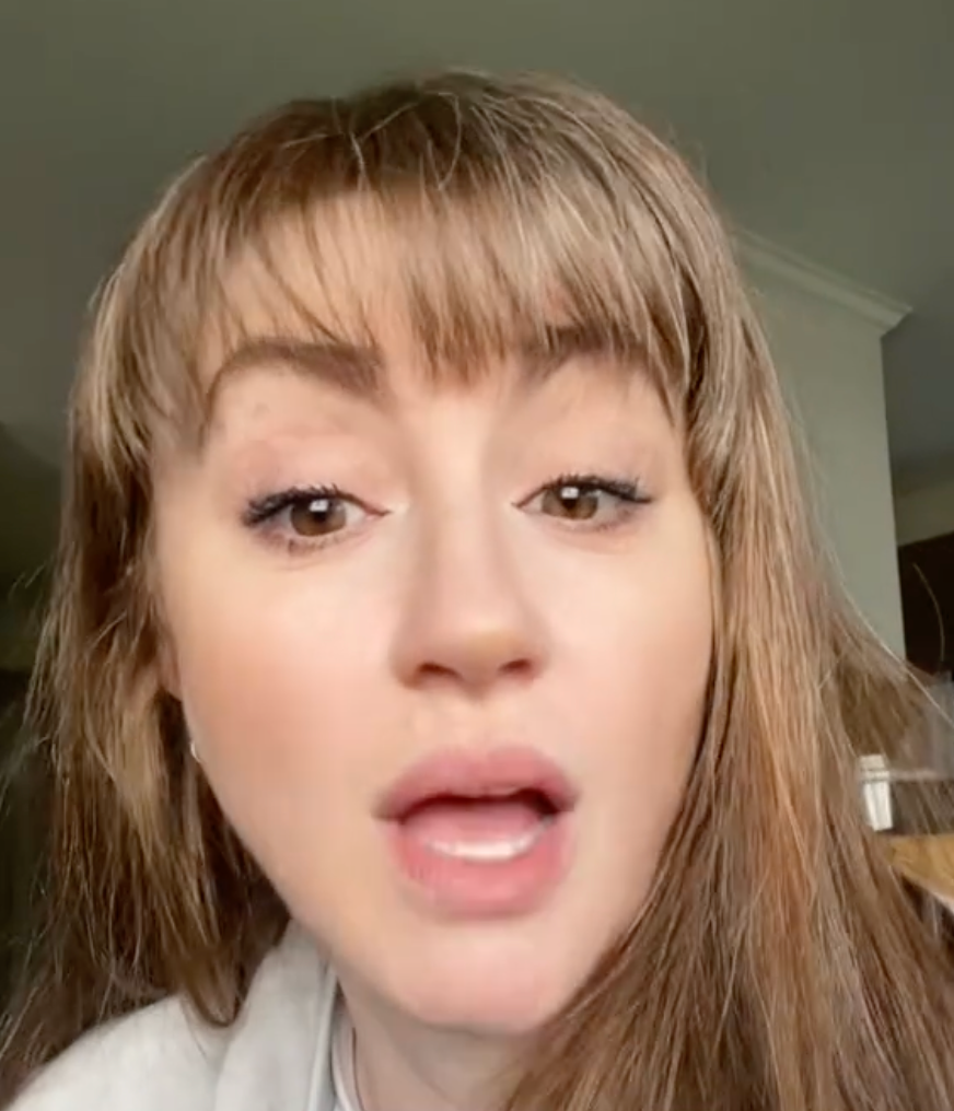 Person speaking directly to the camera with the text "LOCK STEP" at the bottom of the image