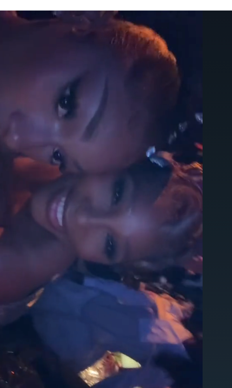 Megan Thee Stallion and Serena Williams in a close-up selfie at an event, smiling at the camera