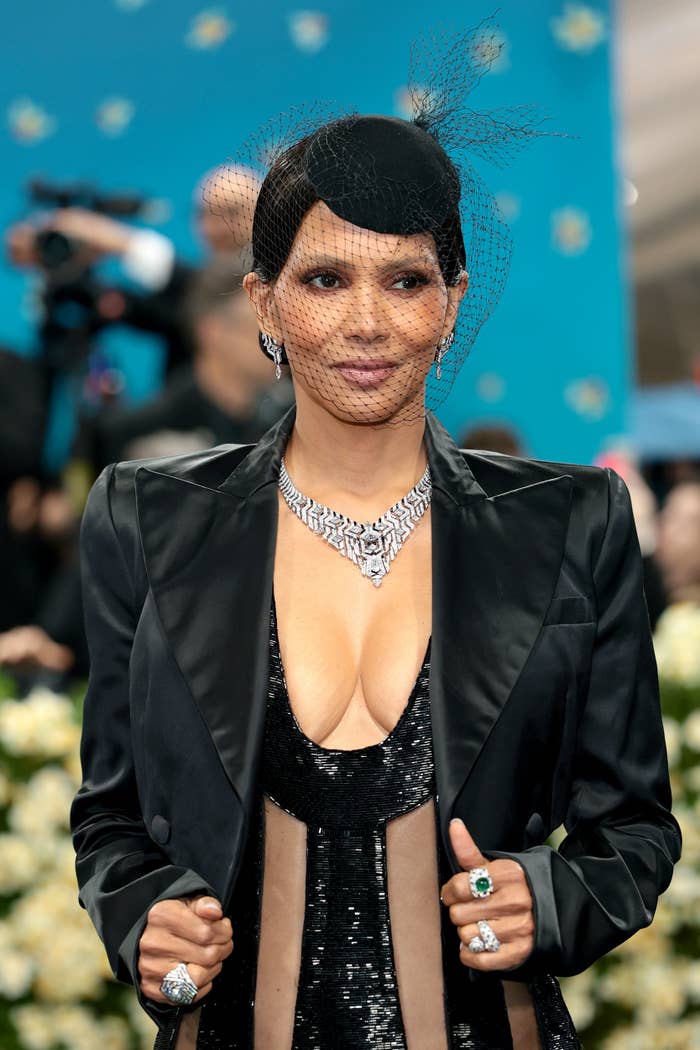 Halle Berry in elegant black gown with a low neckline at the Met Gala