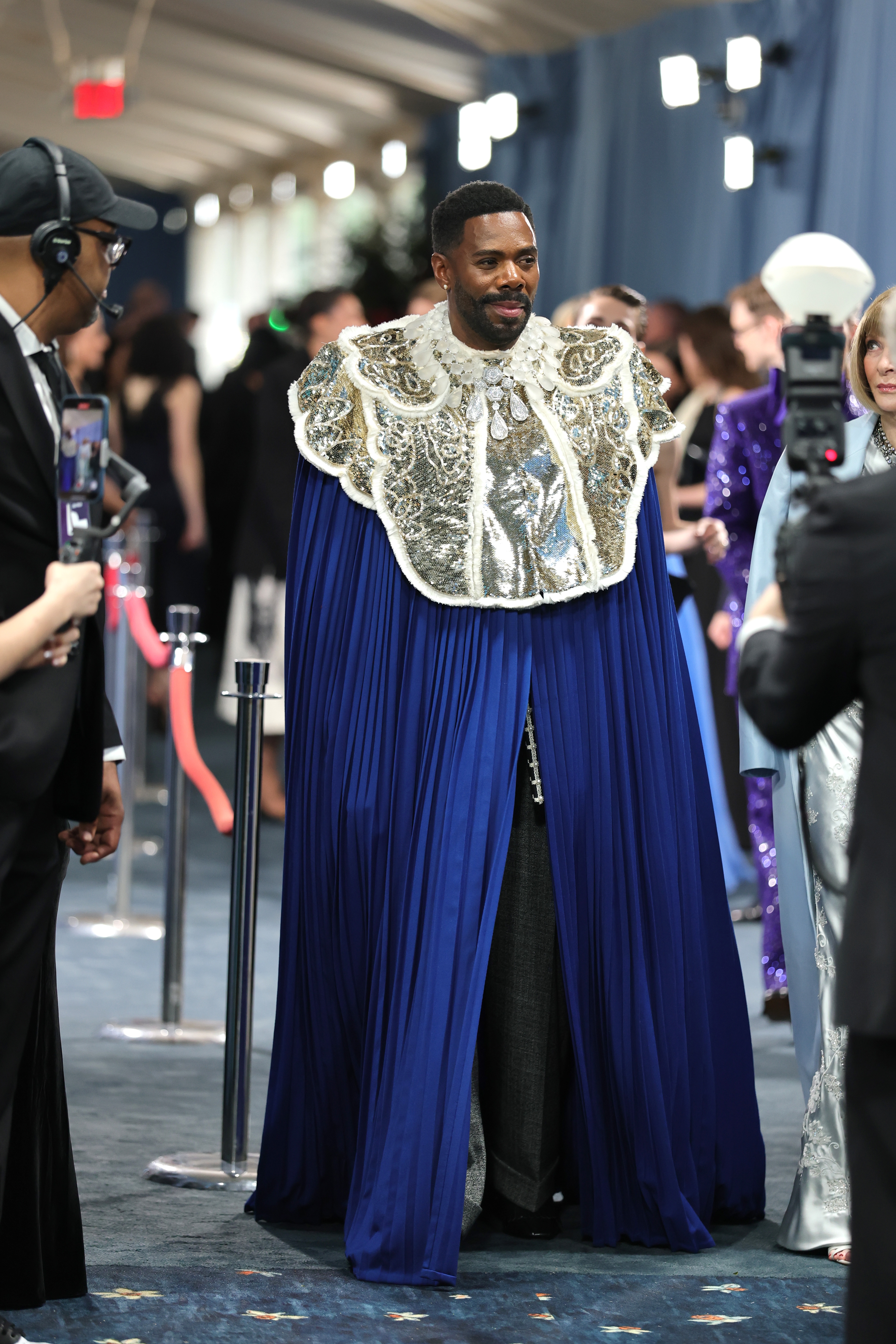 Colman Domingo at the Met Gala in an ornate cape with shimmering silver embroidery