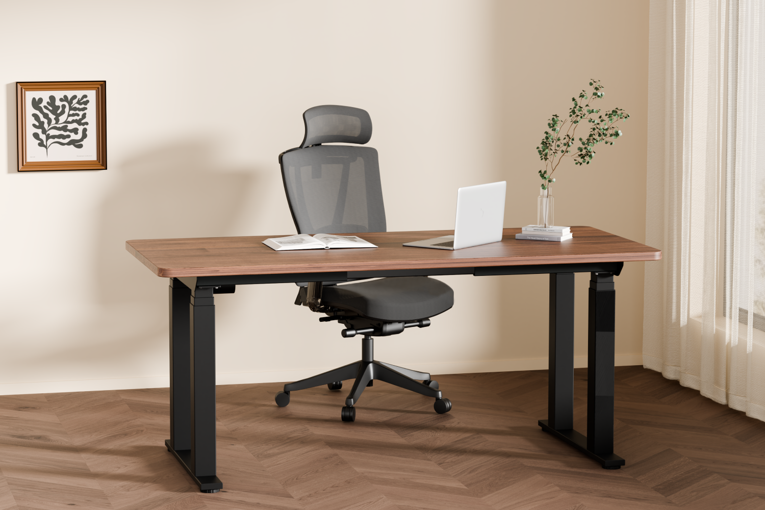 Modern office setup with an adjustable desk, ergonomic chair, laptop, book, and potted plant. Art hangs on the wall
