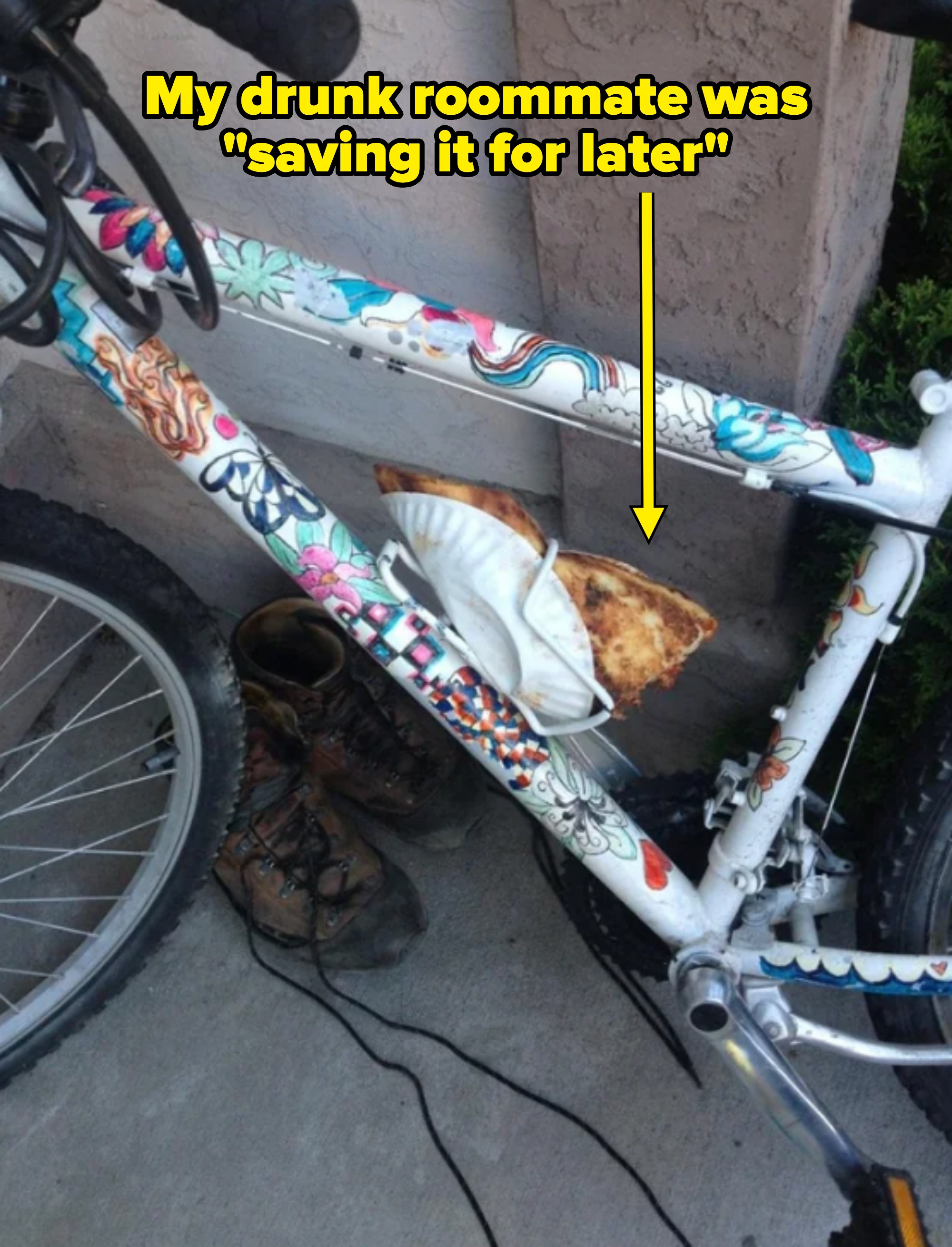 Bicycle with a slice of pizza in a folded paper plate tucked into the water bottle holder. Caption: "My drunk roommate was 'saving it for later'"