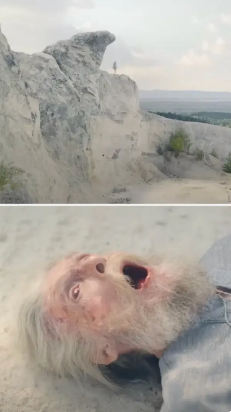 an older man jumps from a cliff and lands on the beach, looking as if he's in pain